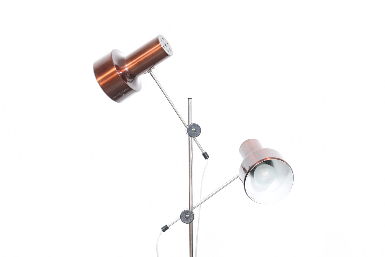 Twin-headed floor lamp with metallic bronze finish