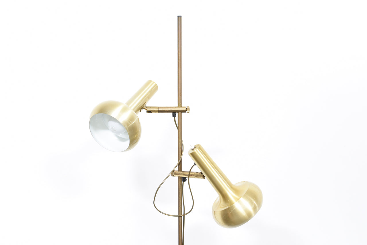 Twin-headed floor lamp with brass shades