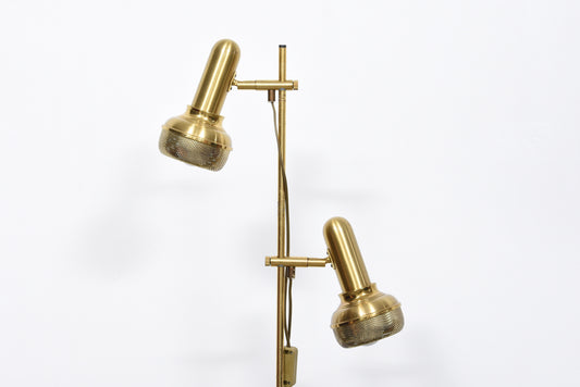 Twin-headed floor lamp with perforated brass shades