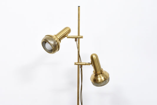 Twin-headed floor lamp with perforated brass shades