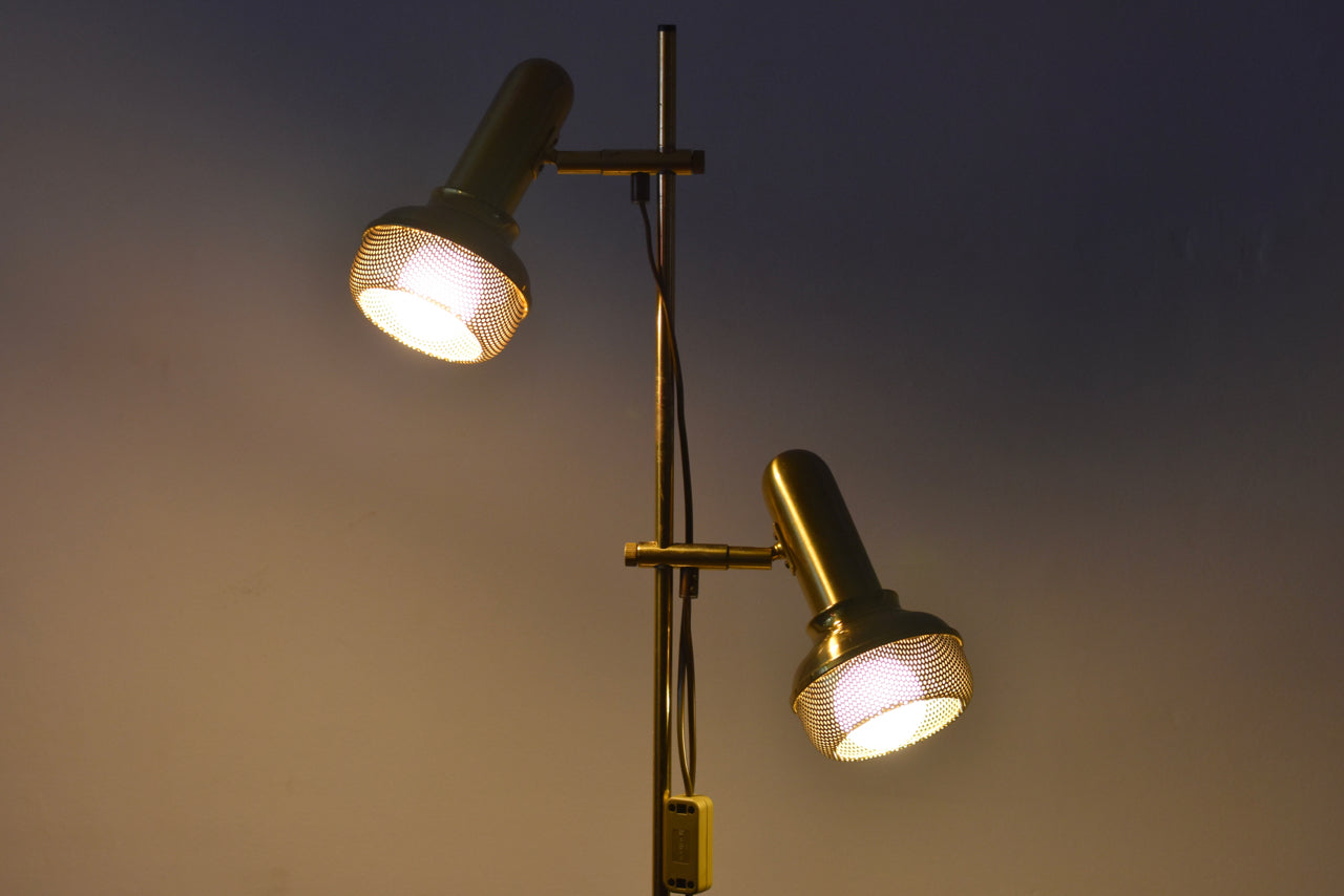 Twin-headed floor lamp with perforated brass shades