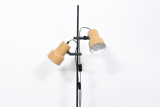 Twin-headed floor lamp with tan shades