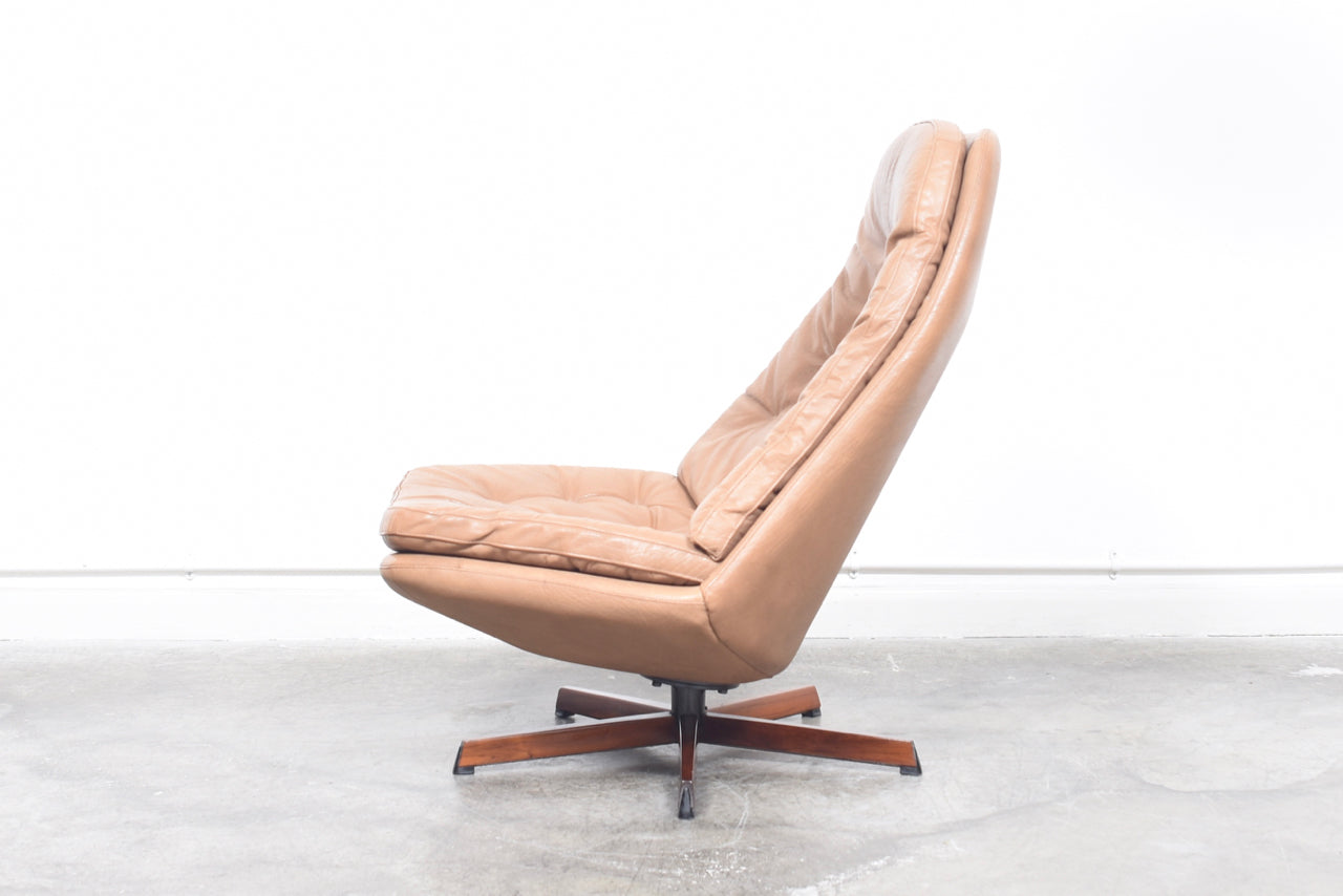 Reclining lounger + ottoman by Madsen & Schubell