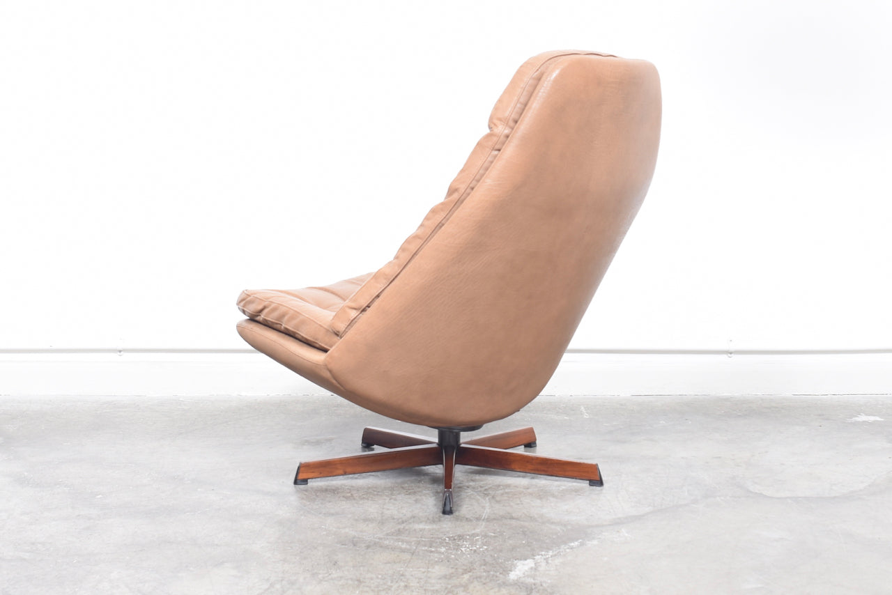 Reclining lounger + ottoman by Madsen & Schubell