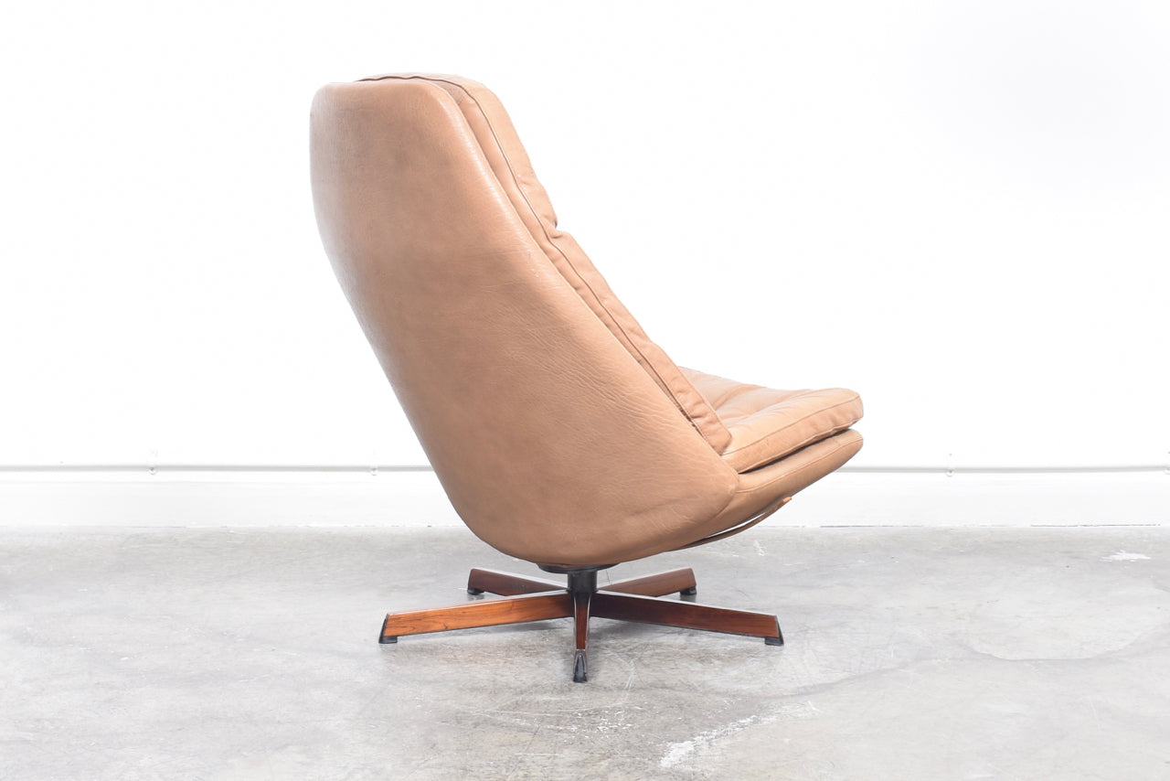 Reclining lounger + ottoman by Madsen & Schubell