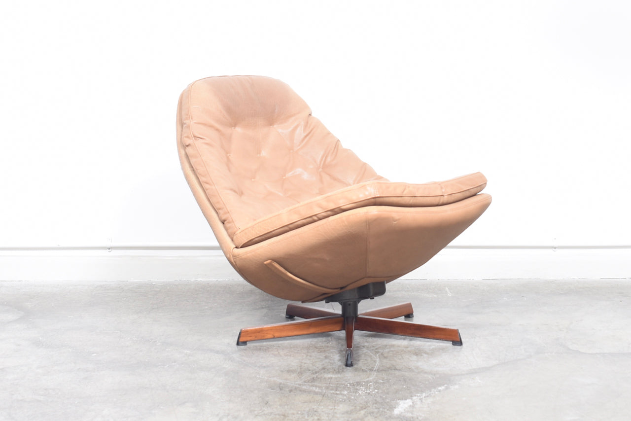 Reclining lounger + ottoman by Madsen & Schubell