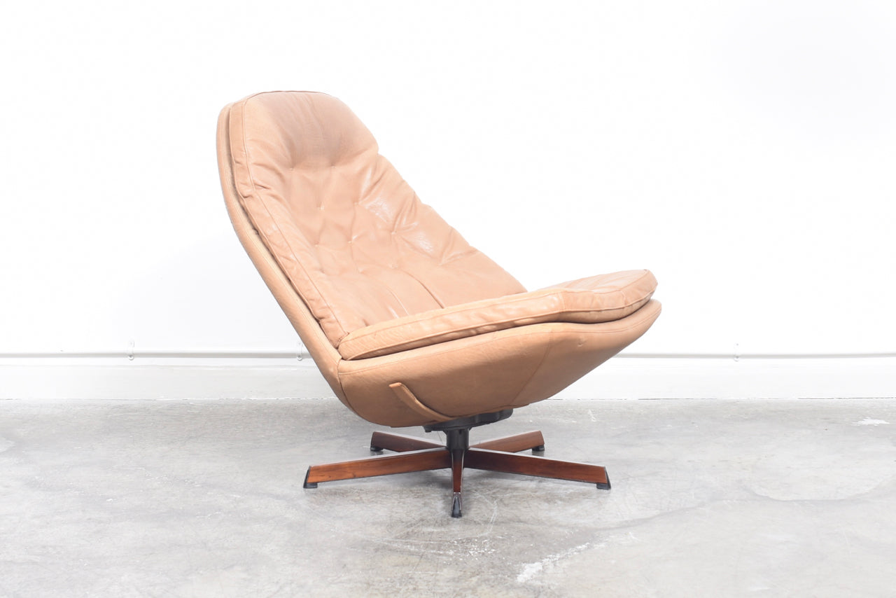 Reclining lounger + ottoman by Madsen & Schubell