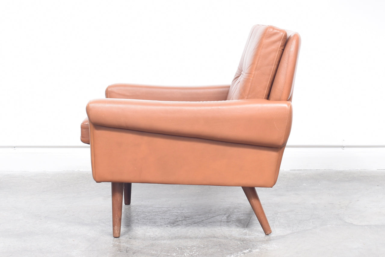 Low back lounge chair + ottoman by Skipper Møbler