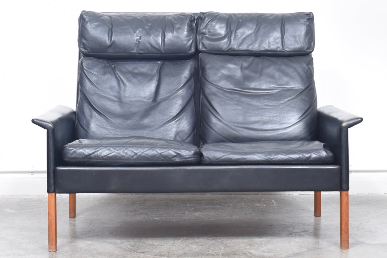 High back two seat leather sofa by Hans Olsen