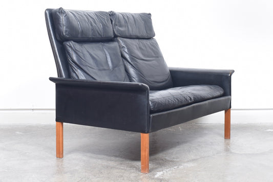 High back two seat leather sofa by Hans Olsen