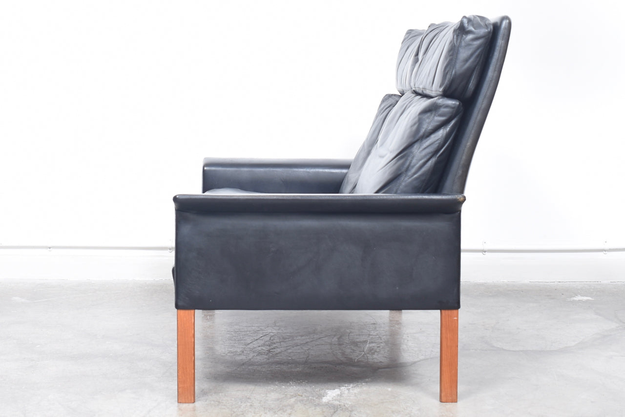 High back two seat leather sofa by Hans Olsen