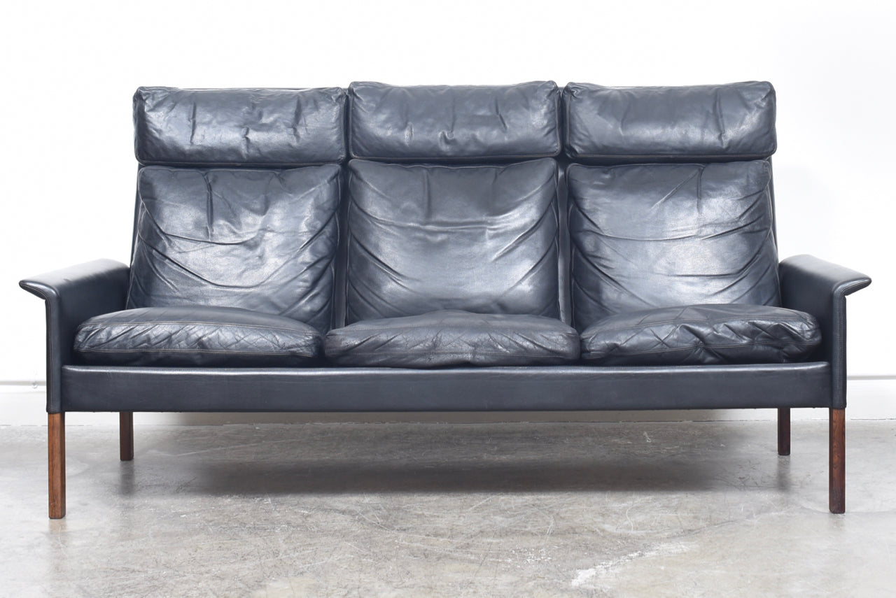 High back three seat leather sofa by Hans Olsen