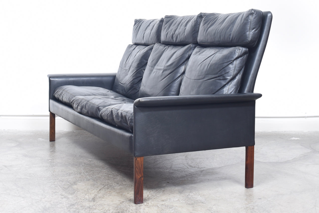 High back three seat leather sofa by Hans Olsen