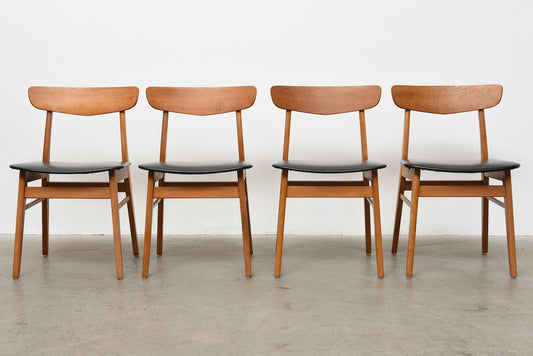 Set of four oak + vinyl chairs by Farstrup