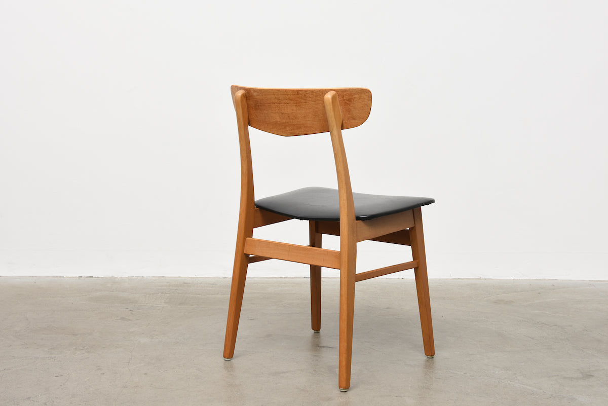Set of four oak + vinyl chairs by Farstrup