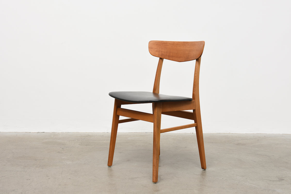 Set of four oak + vinyl chairs by Farstrup