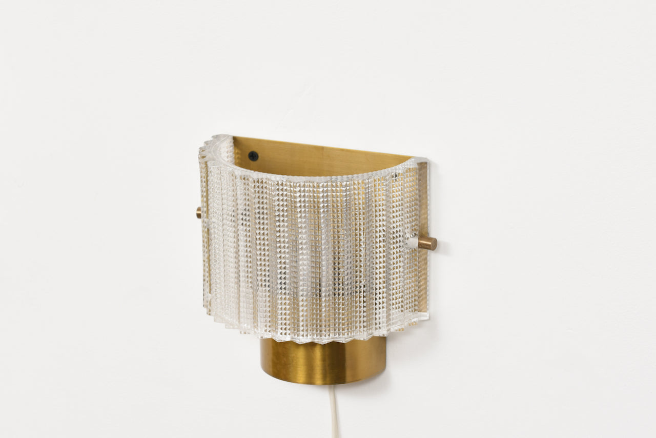 Pair of brass + glass wall lights by Carl Fagerlund