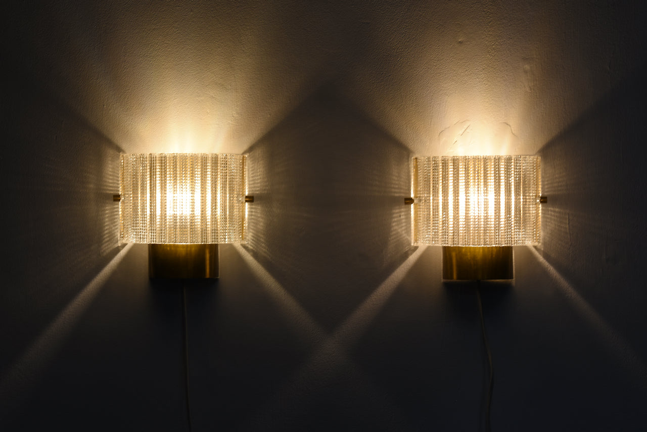 Pair of brass + glass wall lights by Carl Fagerlund