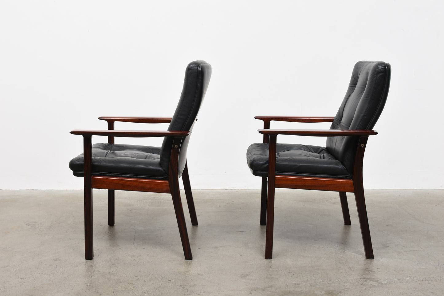 One available: Rosewood + leather armchairs by Arne Vodder