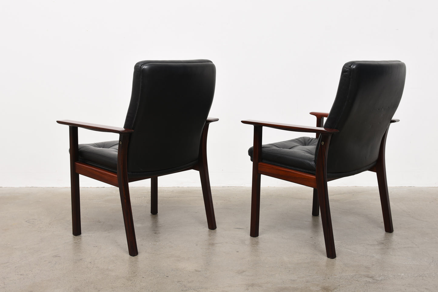 One available: Rosewood + leather armchairs by Arne Vodder