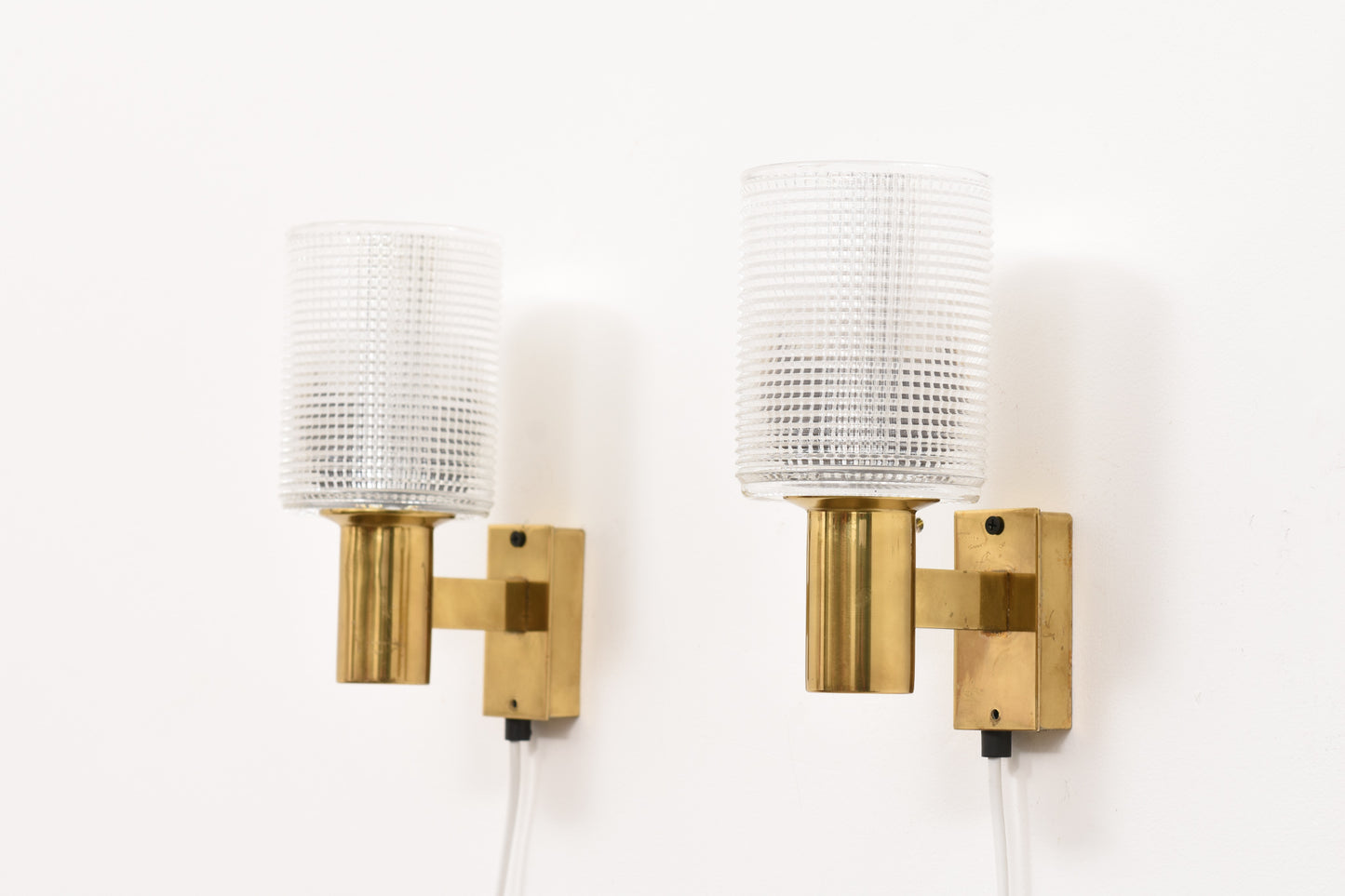 Pair of brass wall sconces by Falkenbergs Belysning