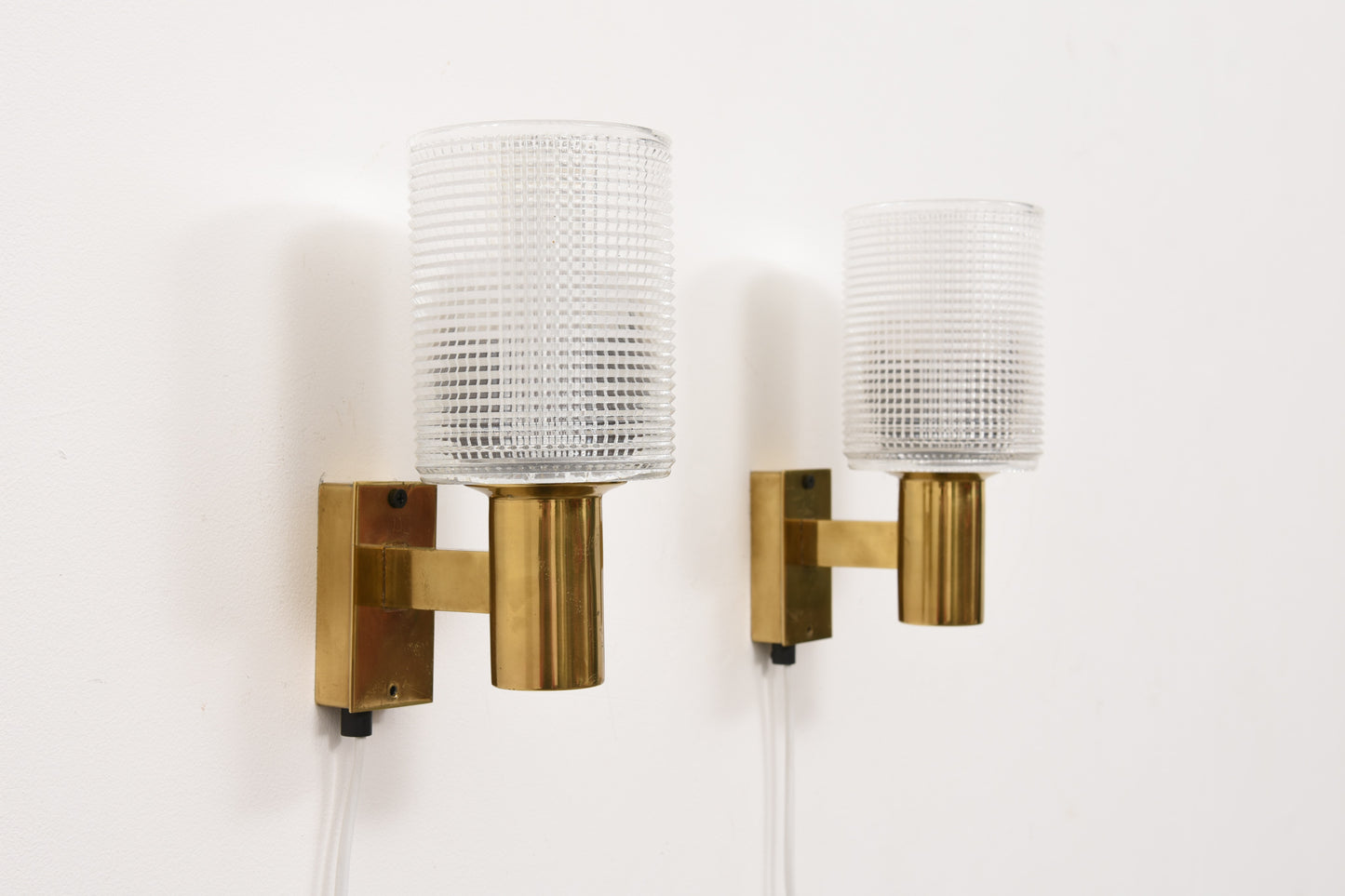 Pair of brass wall sconces by Falkenbergs Belysning