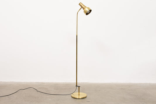 Height-adjustable brass floor lamp