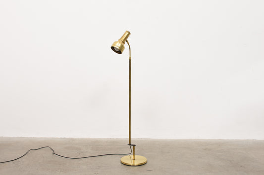 Height-adjustable brass floor lamp