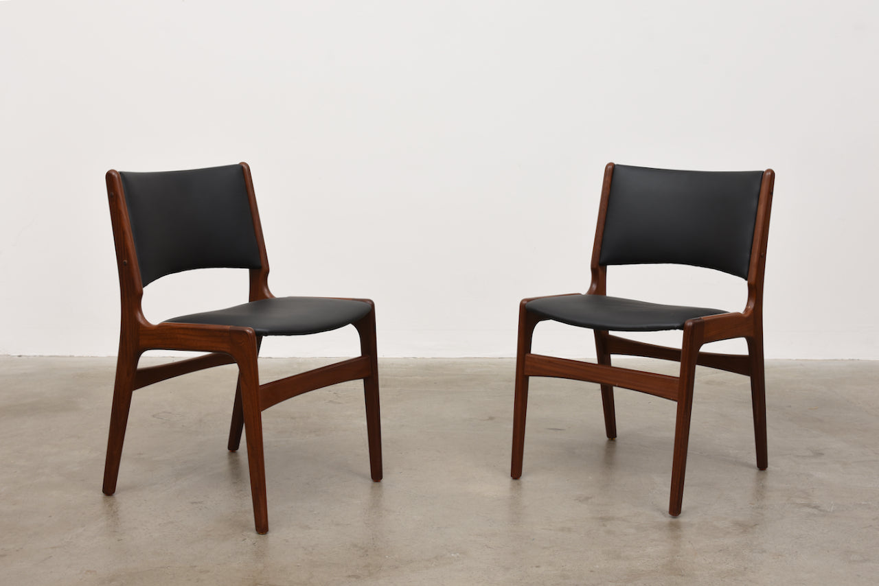 Two available: Teak + vinyl chairs by Erik Buch