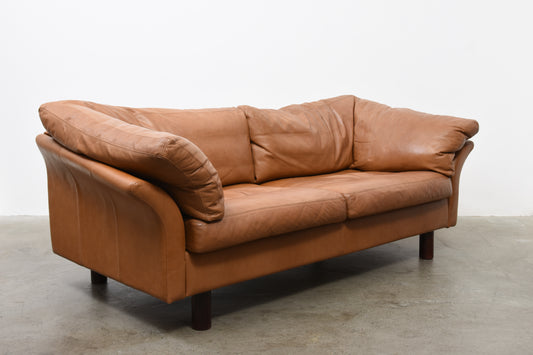 Tan leather sofa by Stouby