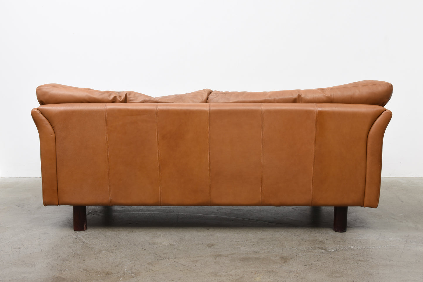 Tan leather sofa by Stouby