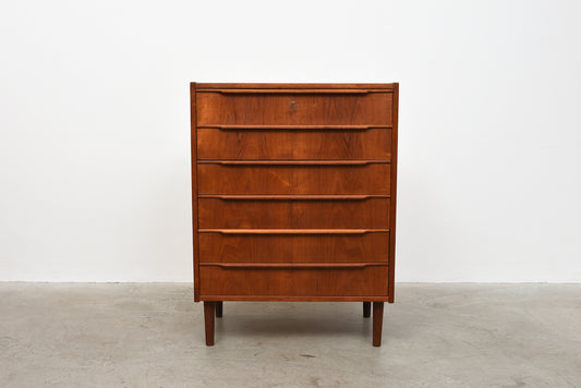 Teak chest of drawers with lipped handles