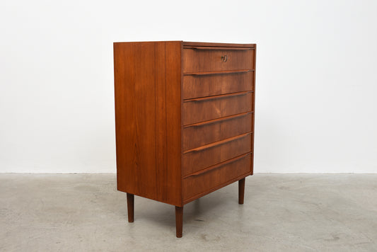 Teak chest of drawers with lipped handles