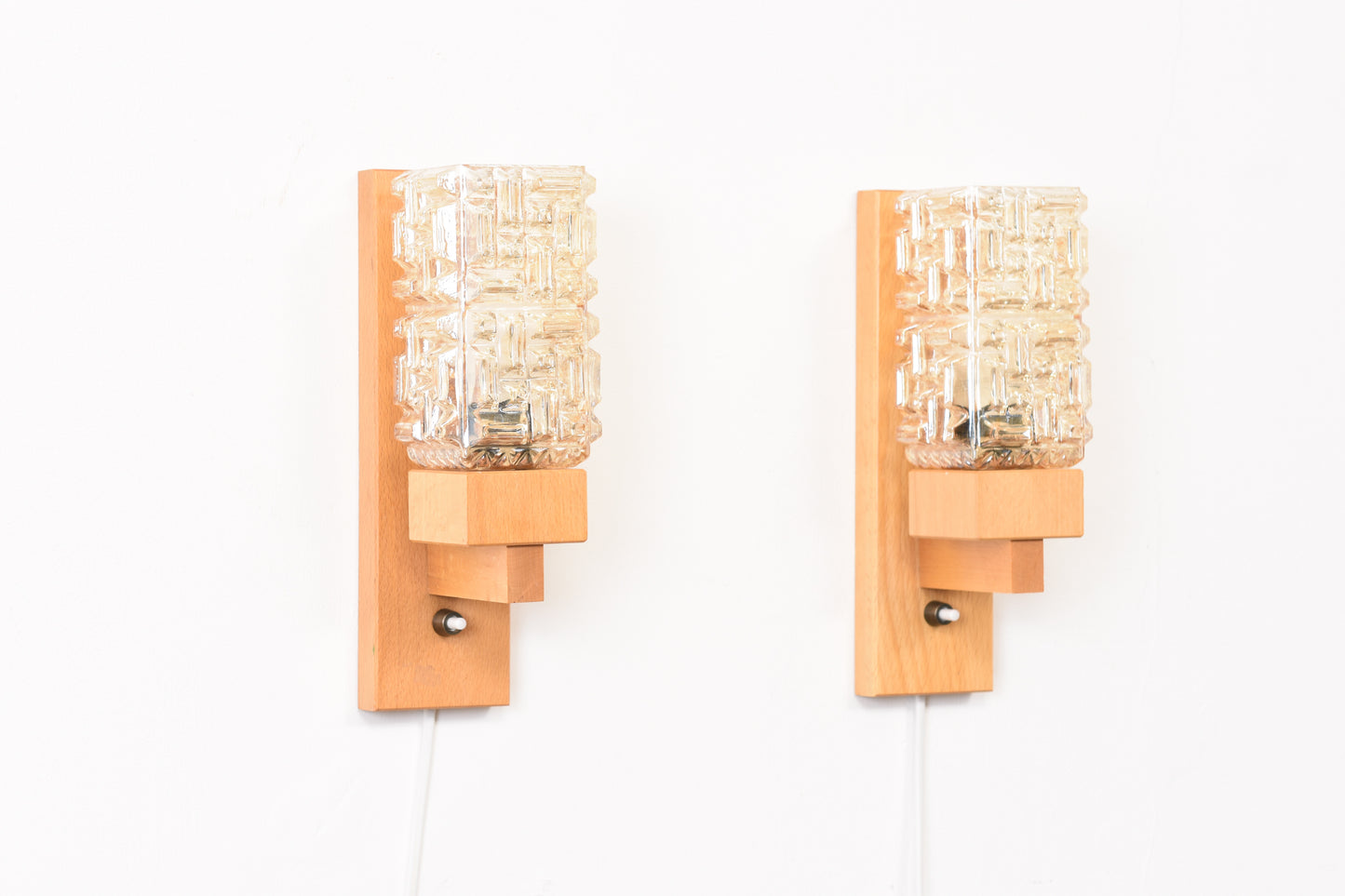 Pair of glass + oak wall lights by Vitrika