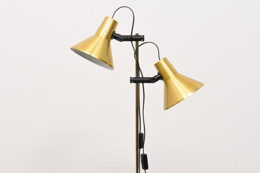 Vintage twin-headed brass floor lamp