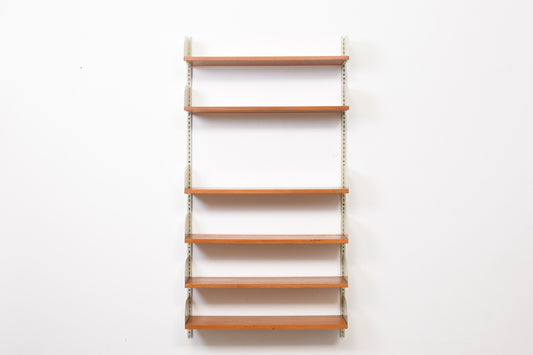 Single bay of teak shelving
