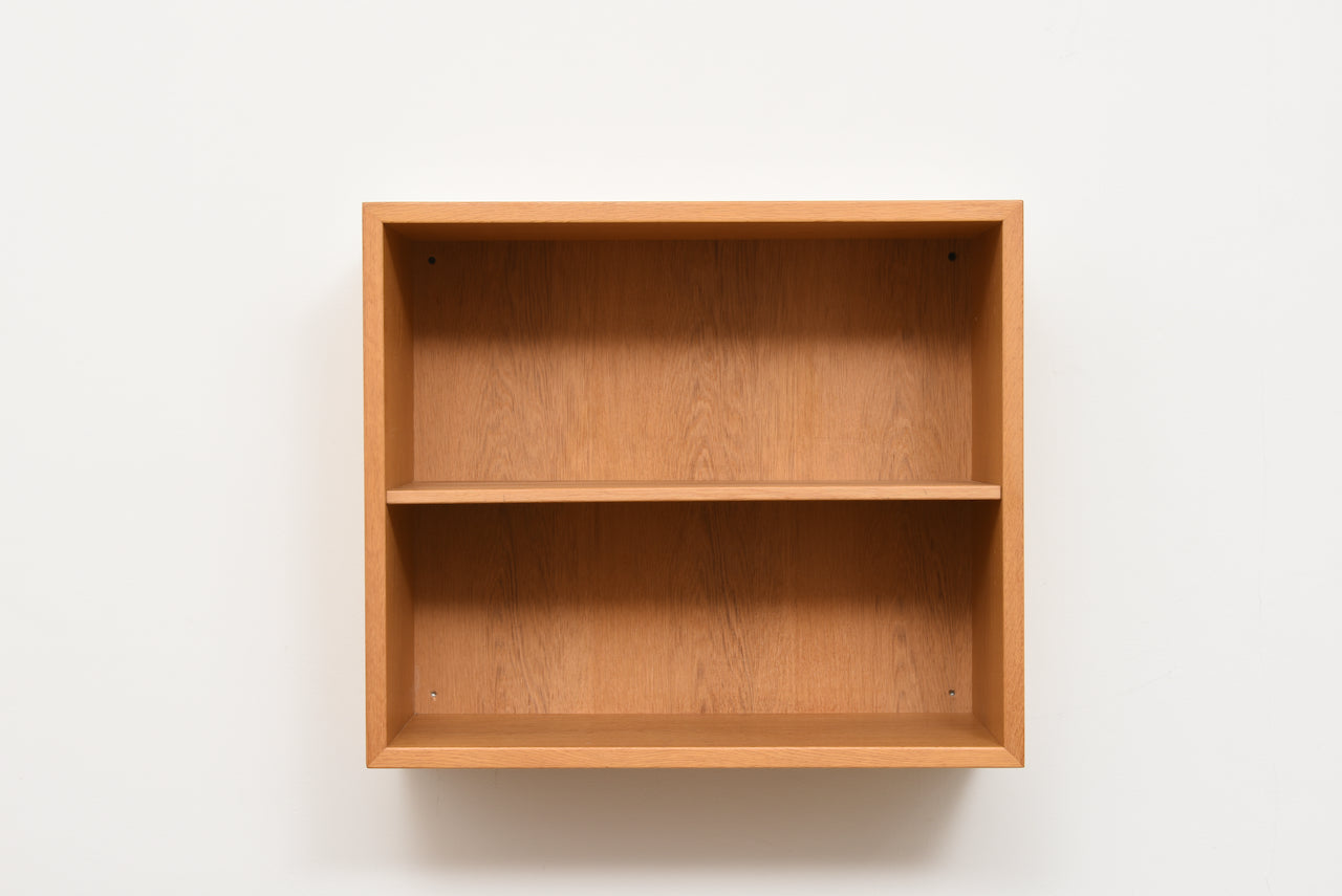 Wall-mounted oak bookshelf by Børge Mogensen