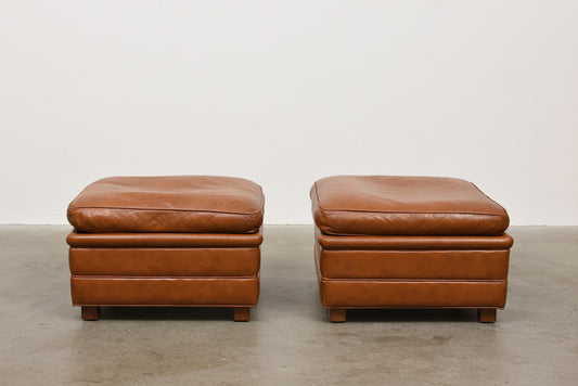 Two available: 1970s caramel leather ottomans