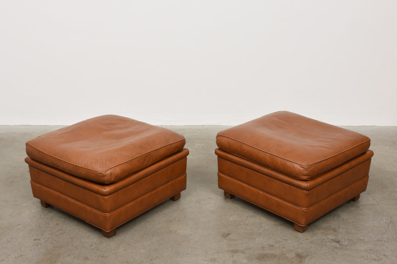 Two available: 1970s caramel leather ottomans