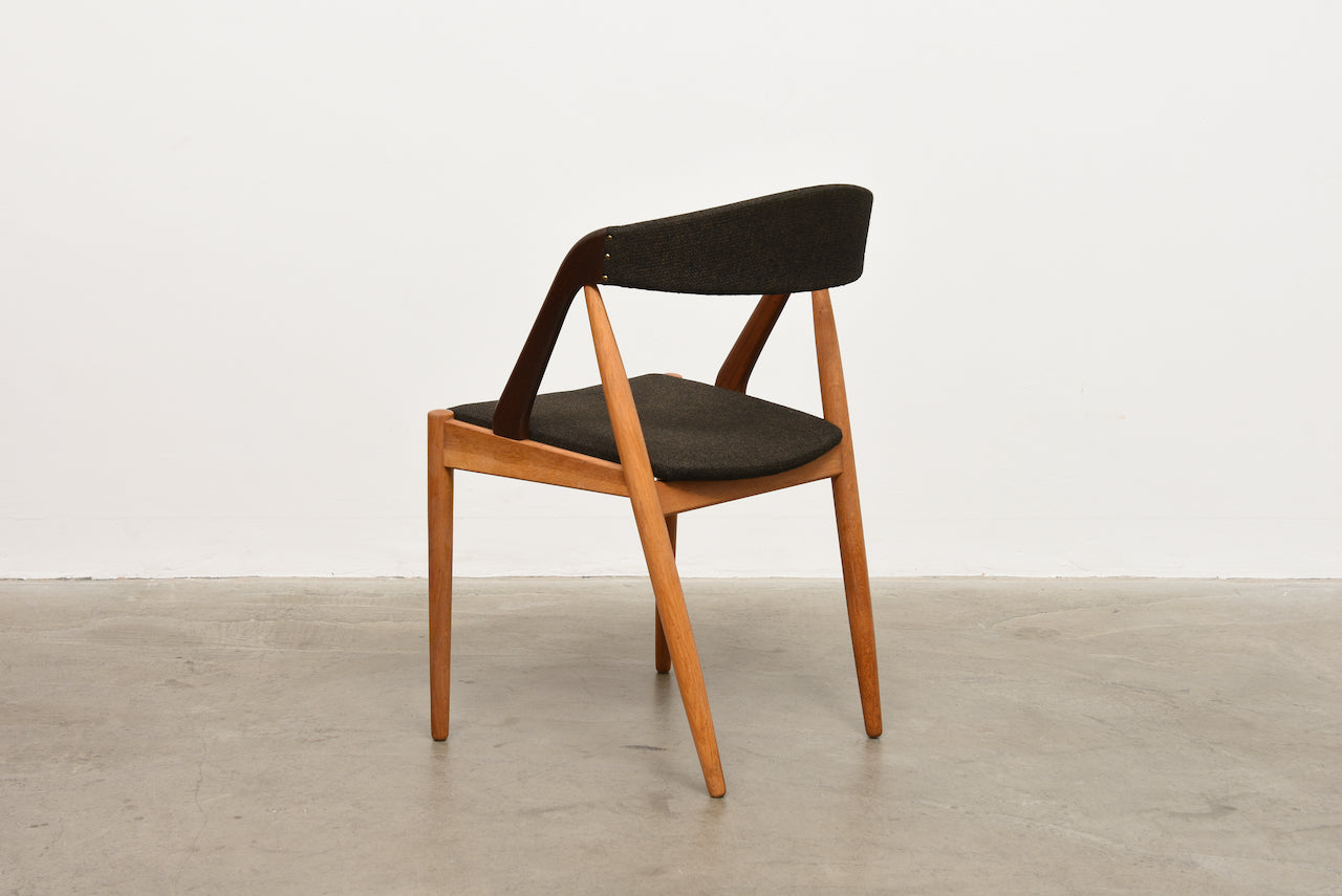 Includes new upholstery: 1960s teak + oak chairs by Kai Kristiansen