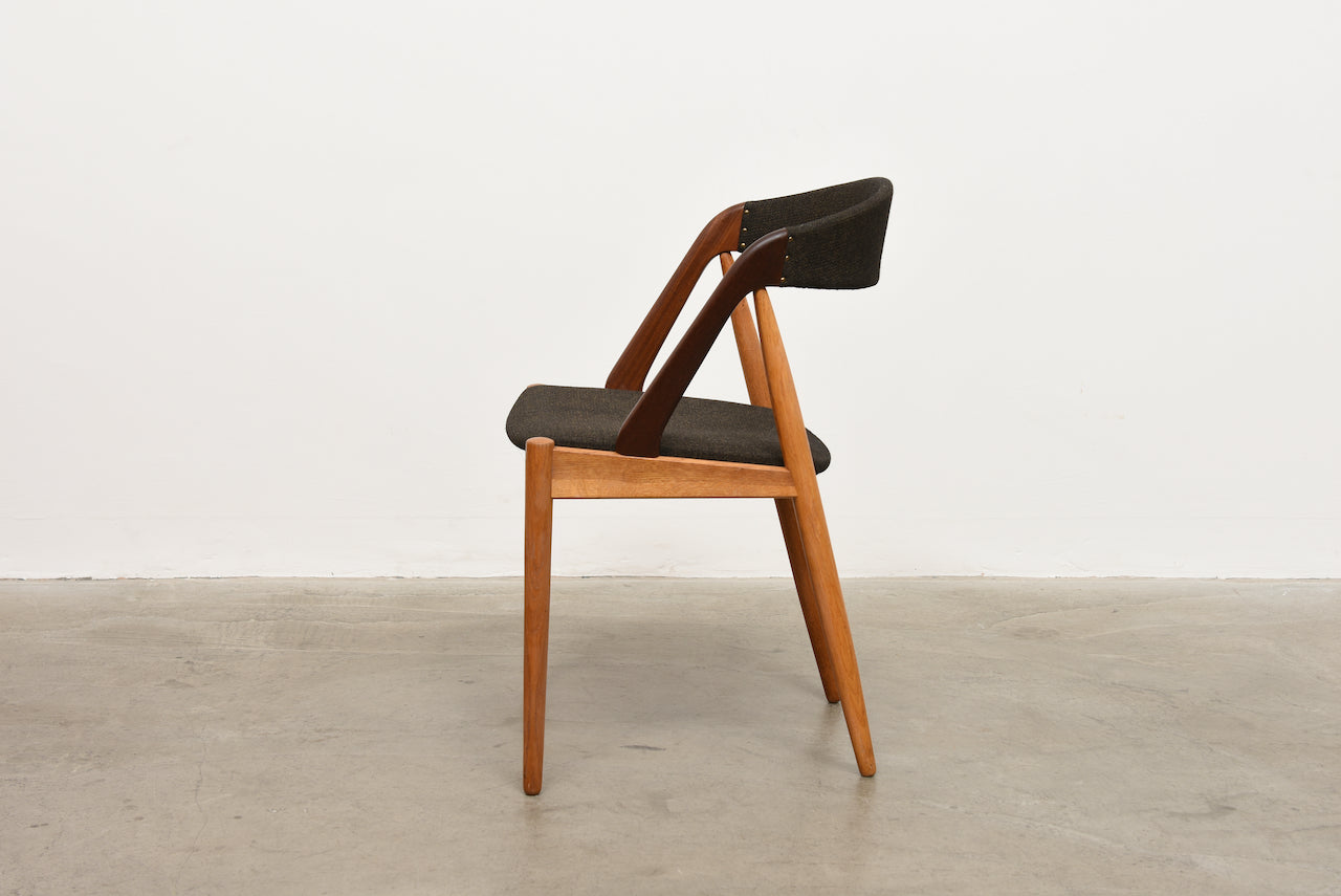 Includes new upholstery: 1960s teak + oak chairs by Kai Kristiansen
