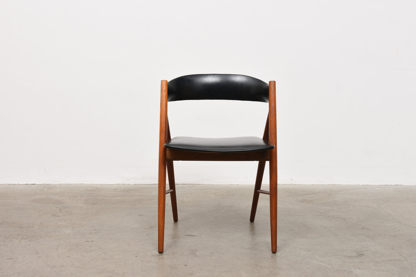 1960s Swedish teak + vinyl chair