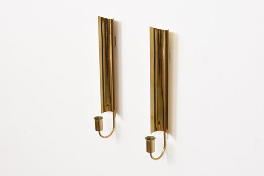Two available: 'Reflex' brass candle holders by Pierre Forsell