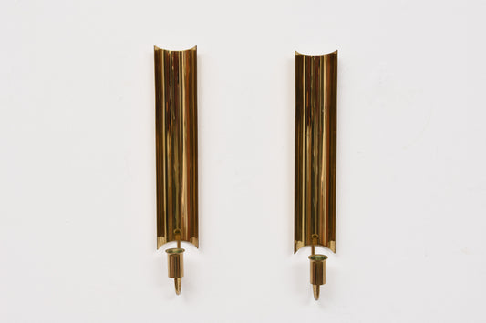 Two available: 'Reflex' brass candle holders by Pierre Forsell