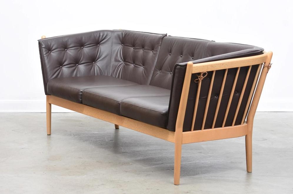 Model J148 in beech + leather sofa by Erik Jørgensen