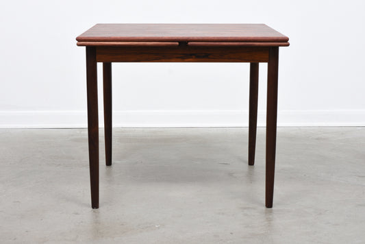 Extending rosewood dining table