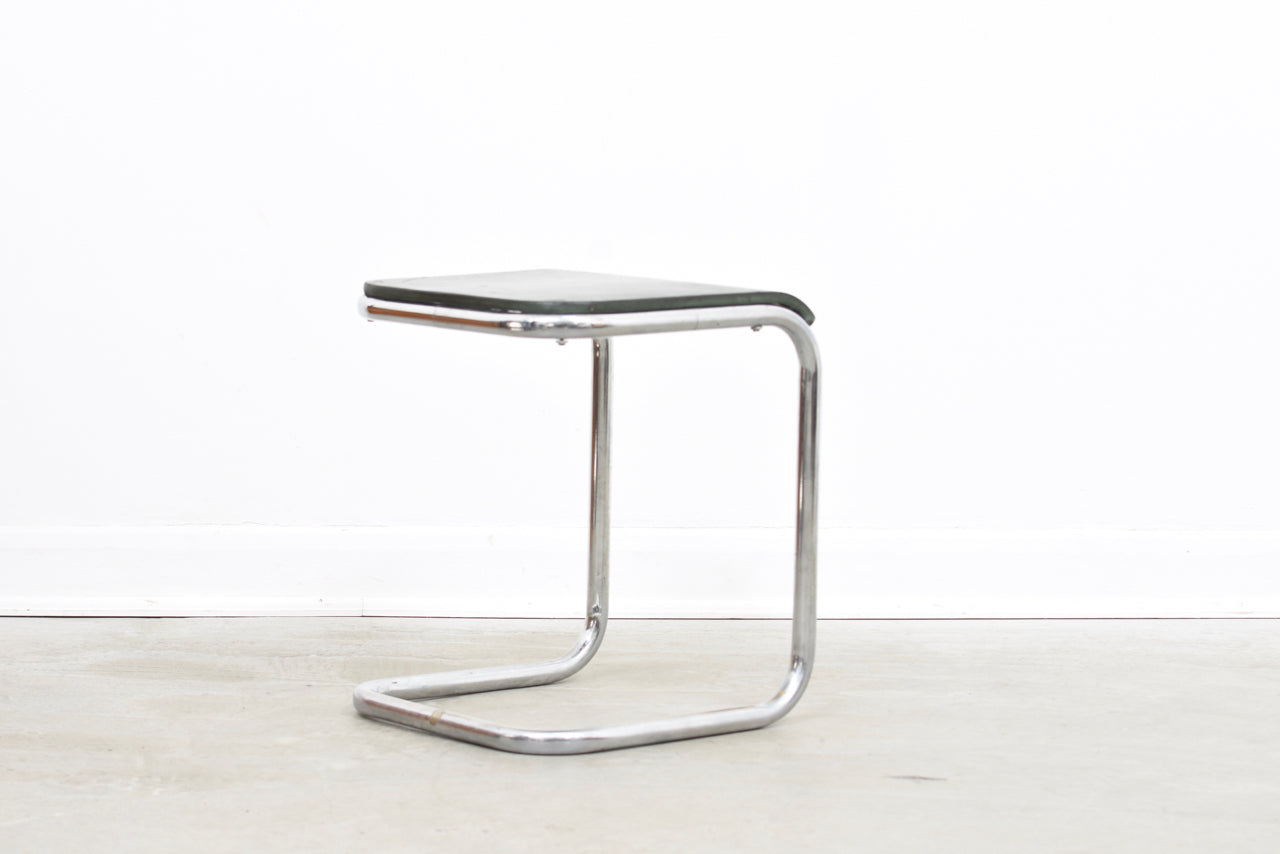 Leather + steel cantilever stool