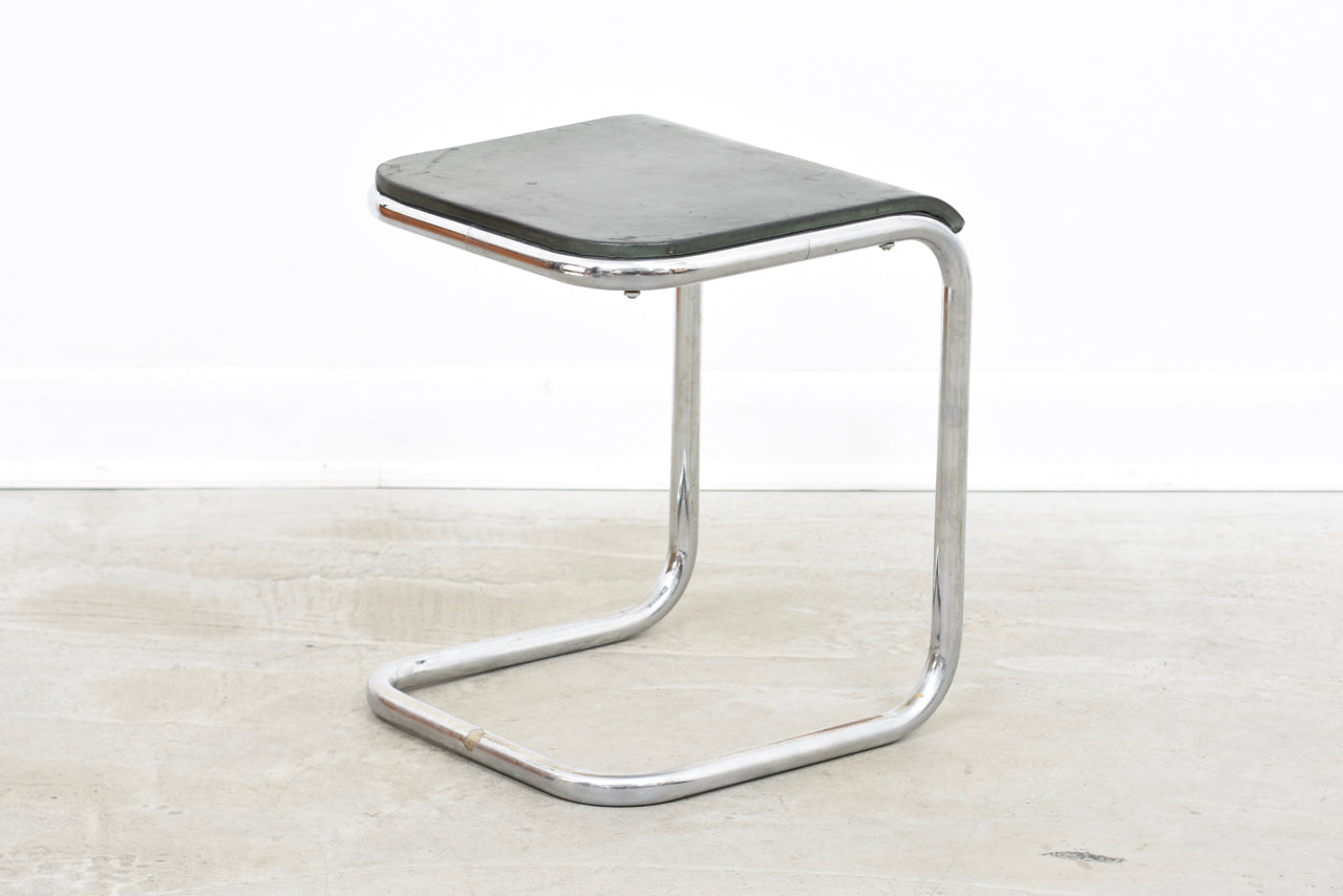 Leather + steel cantilever stool