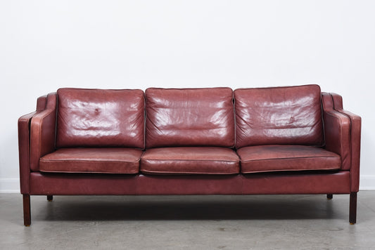 Three seat leather sofa by Stouby