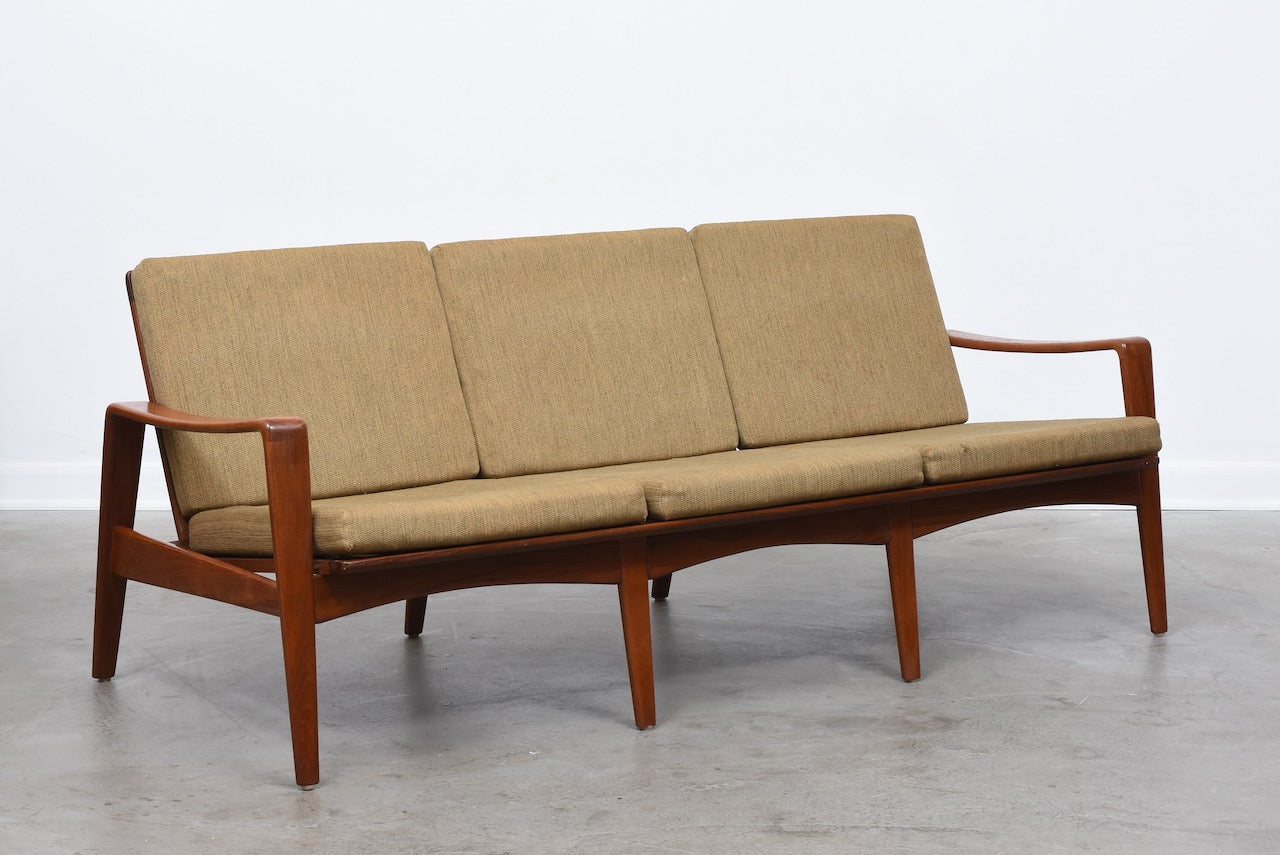 New upholstery included: 1960s Danish teak sofa